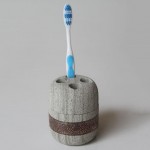 Tooth brush holder - grey stone with copper inlay